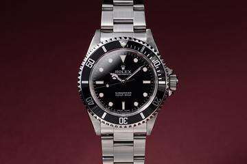 2005 Rolex Submariner 14060M with Box and Papers
