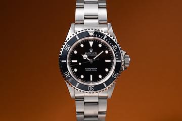 1995 Rolex Submariner 14060 with Papers & Service Papers