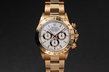 1997 Rolex 18k YG Daytona 16528 White Dial