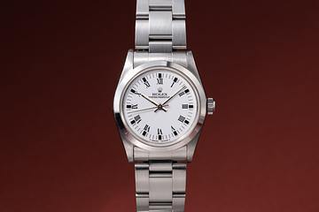 1993 Rolex Mid-Sized Oyster Perpetual 67480 White Roman Index Dial with Papers