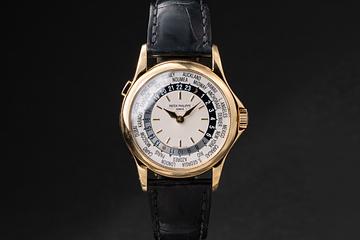 Patek Philippe 18K YG World Time 5110J with Papers