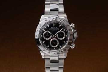 2000 Rolex Daytona 116520 Black Dial with Papers