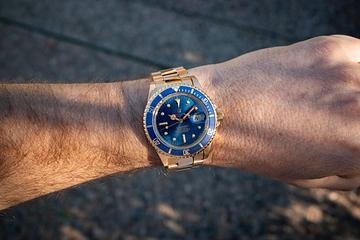 1976 Rolex 18K YG Submariner 1680 Blue Dial and Arabic Date Disk