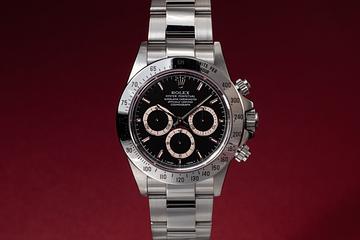 1999 Rolex Daytona 16520 Black Dial with Papers & Service Papers