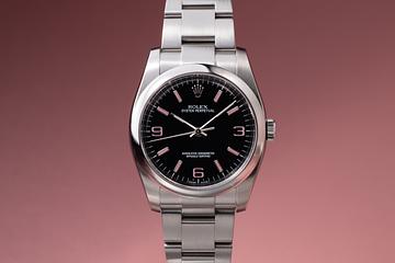 2010 Rolex Oyster Perpetual 1166000 Black & Pink Lume 3, 6, 9 with Papers