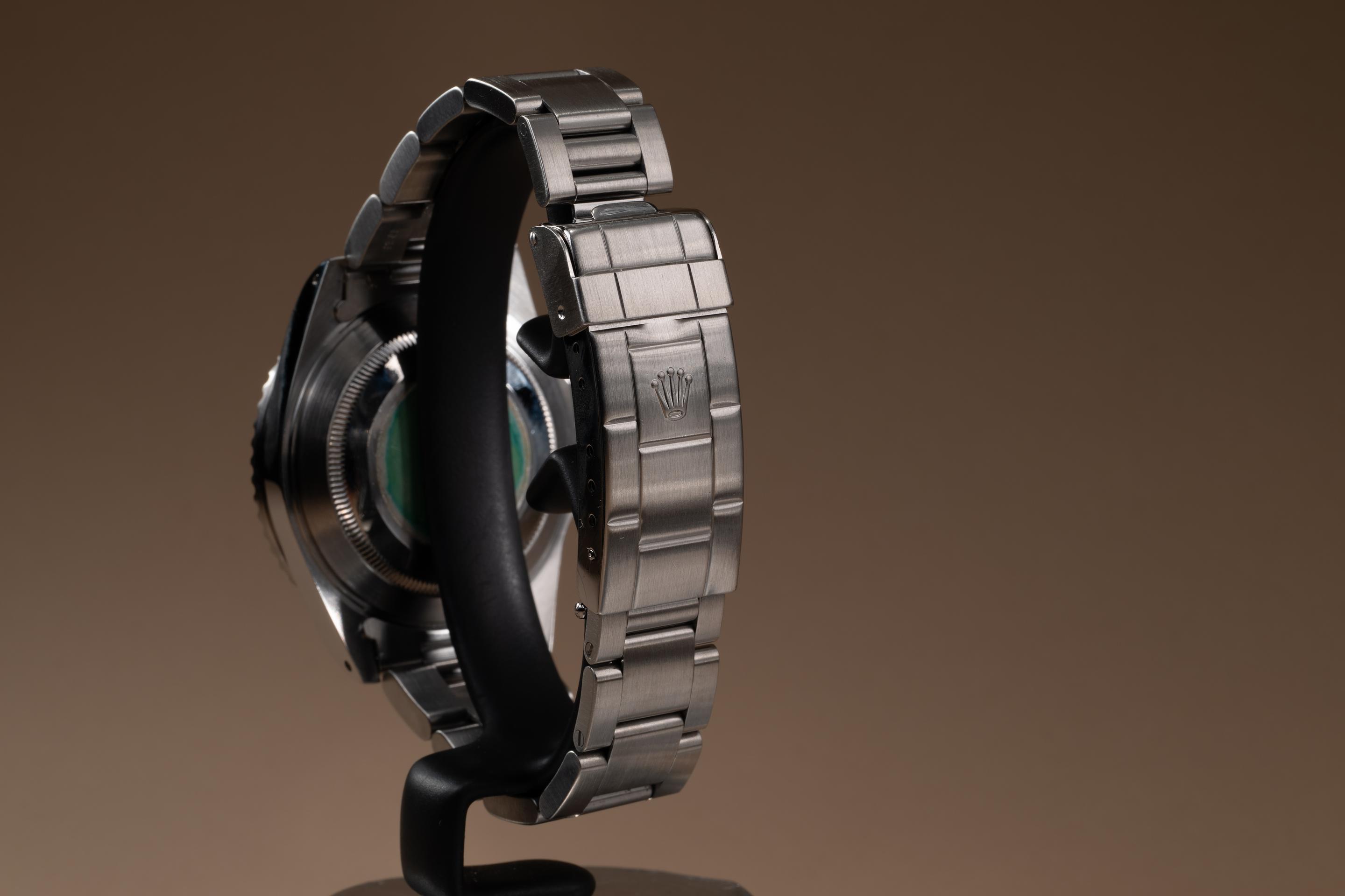 1996 Rolex Submariner 14060 with Papers | Tropical Watch