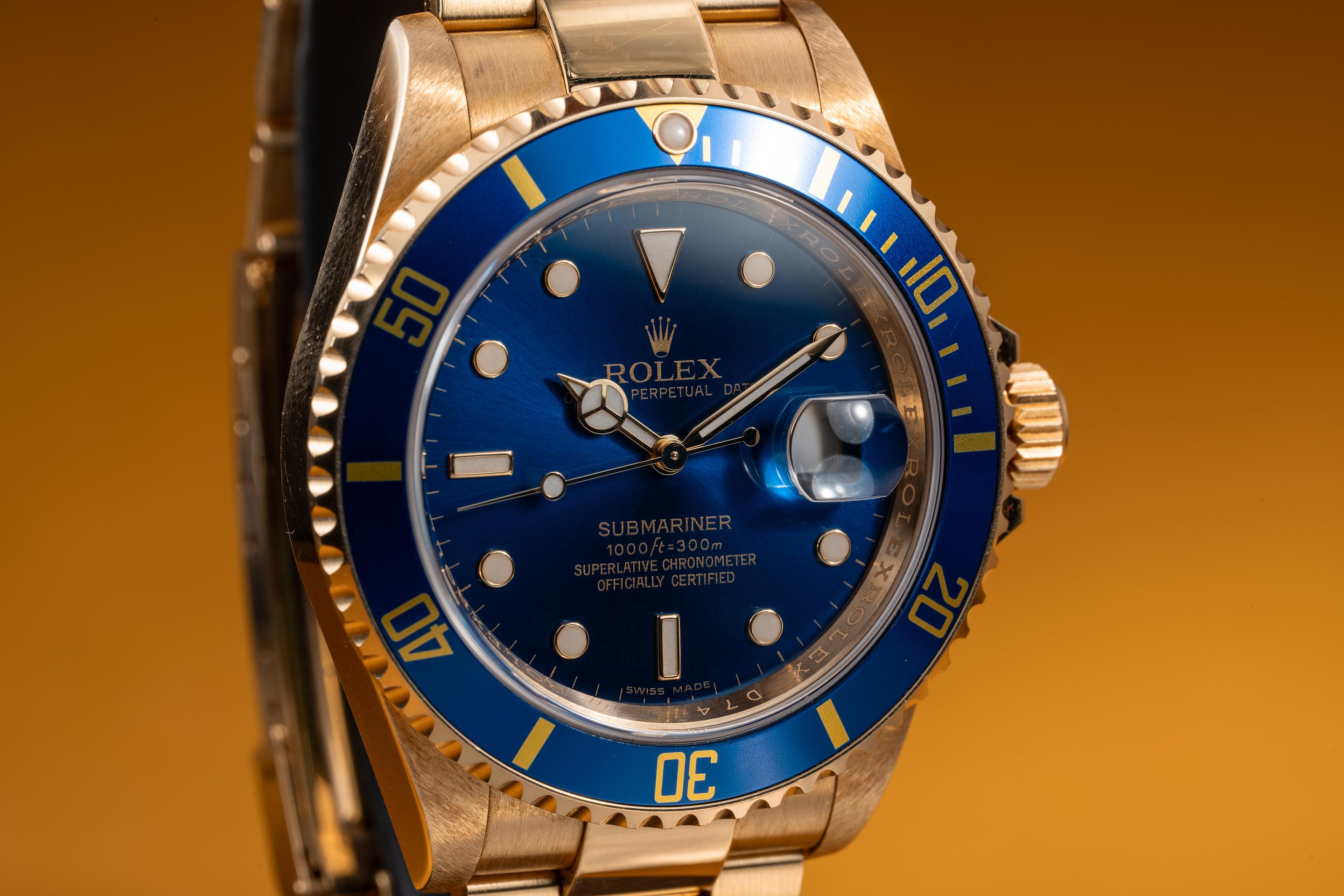 2005 Rolex 18K YG Submariner 16618 Blue Dial and Chinese Date Disk