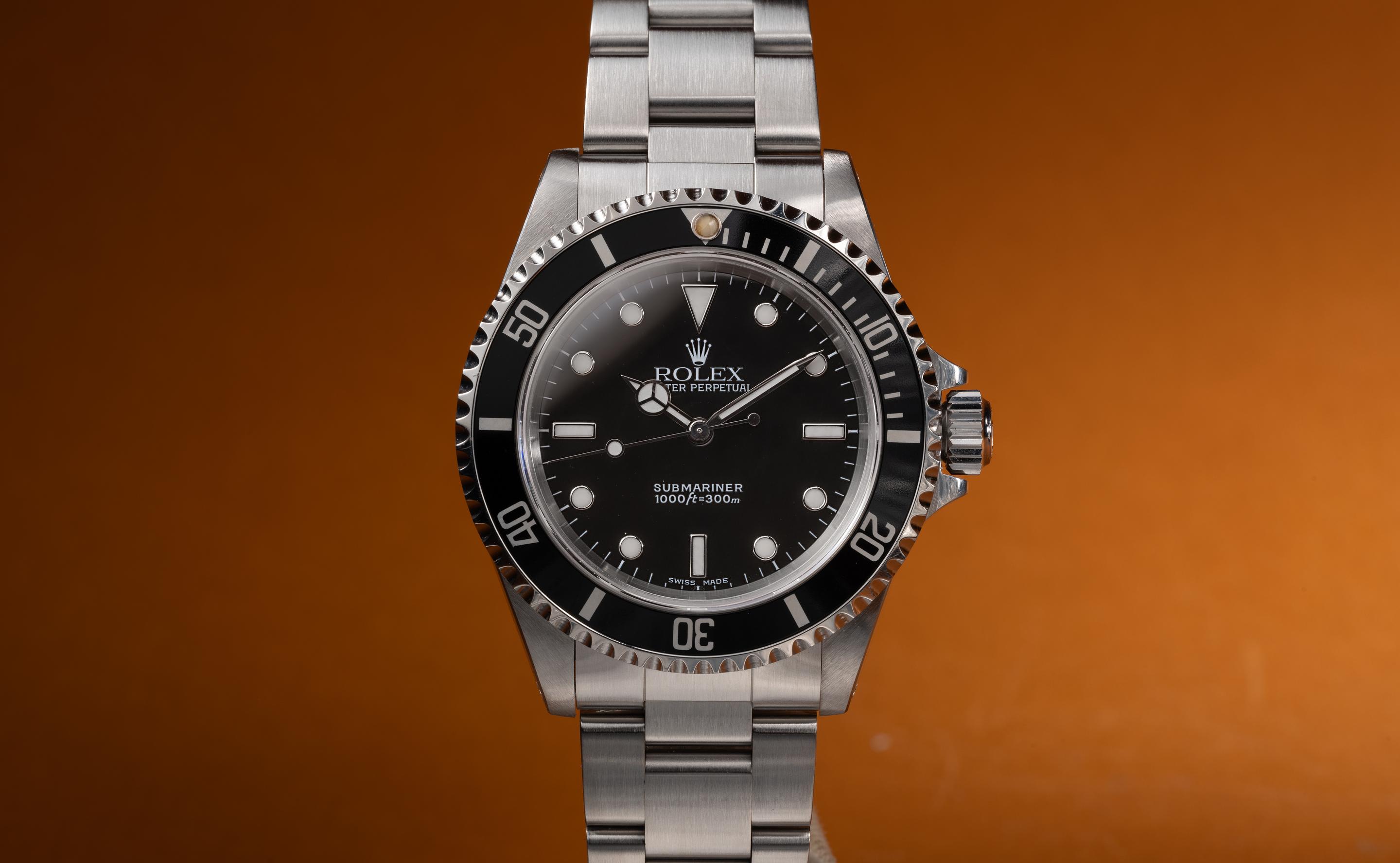 Tropical Watch 2000 Rolex Submariner 14060M with Papers