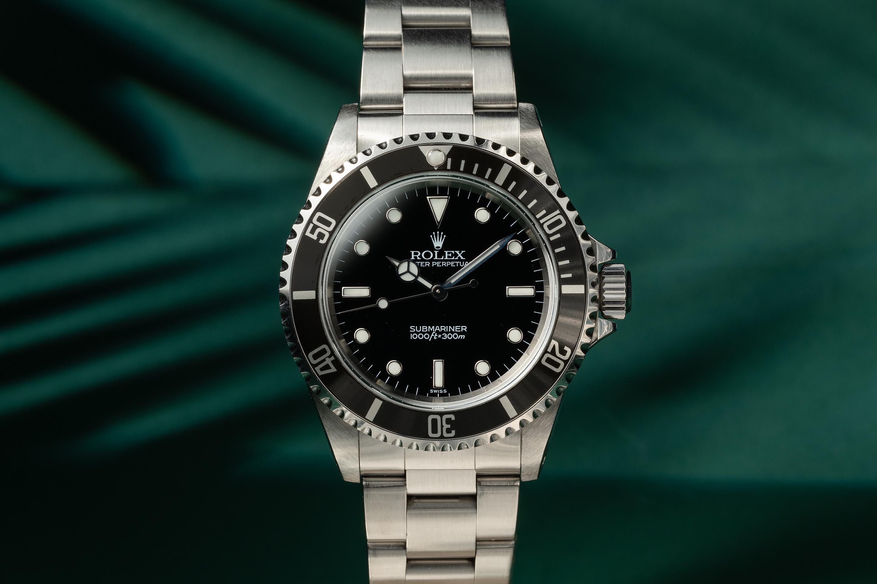 1999 Rolex Submariner 14060 Swiss Only Dial with Papers