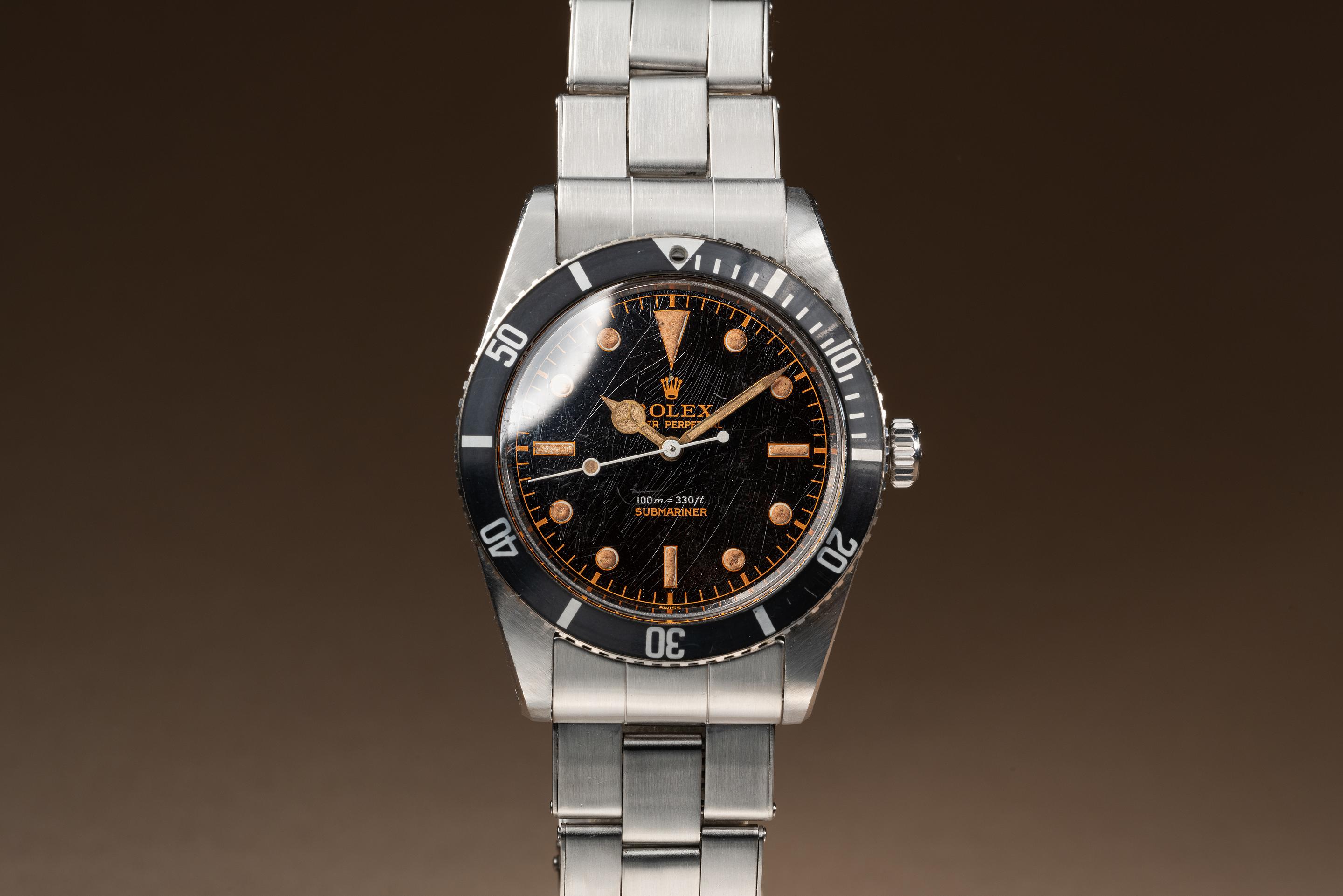 Rolex submariner hotsell tropical dial