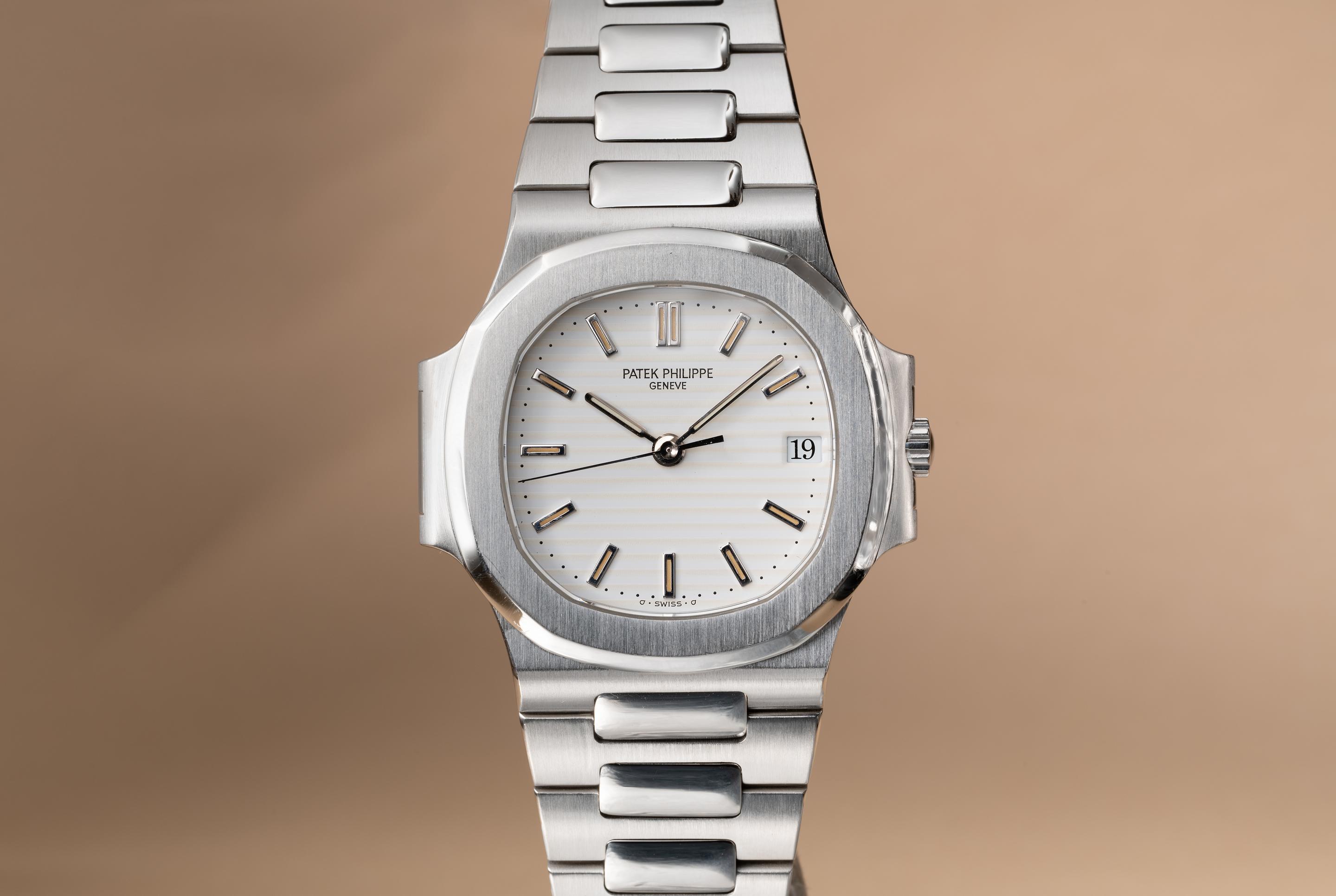 Patek philippe nautilus white face hot sale