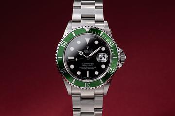 NOS 2007 Rolex Green Submariner 16610LV with Papers