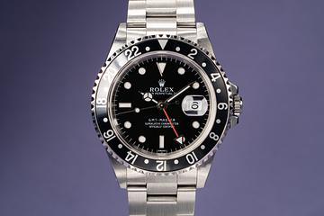 1998 Rolex GMT 16700 with Swiss only Dial and Papers